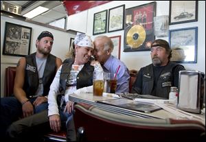 Vice President Joe Biden's talks to customers during a stop at Cruisers Diner in Seaman, Ohio.