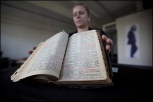 A notation is seen on Elvis Presley's personal Bible as the book waits to be sold at an auction of pop memorabilia in Stockport near Manchester, England.