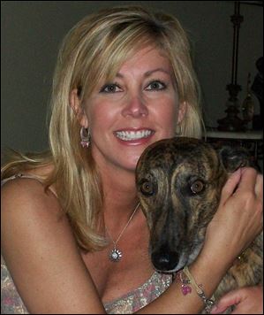 Carla Woodell with her dog, Blitzen.