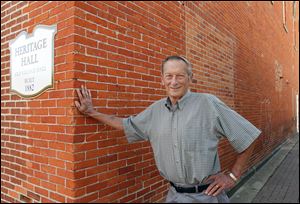 Ernie Gill, a trustee with the The Clyde Heritage League, is the leader overseeing the  preservation of the building's brick exterior.