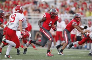 Paul Moses, 5, breaks free for a long run in a game against Bedford earlier this year.