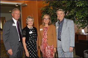 From left: George Chapman, Sue Savage, Polly Taylor-Gerken, and Bob Savage at the United Way Evening with Geoffrey Canada.