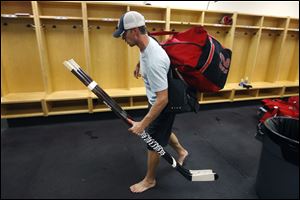Carolina Hurricanes' Eric Staal leaves the locker room after an informal workout Friday, in Raleigh, N.C. Staal was taking his gear, which is normally stored in the lockers, with him as the players will not be allowed to use the facility during the lockout.