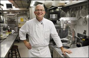 White House pastry chef Bill Yosses as he poses in his kitchen.