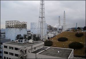 Smoke billows from the Unit 3 reactor at the Fukushima Dai-ichi nuclear power plant in Okuma town, Fukushima Prefecture, northeastern Japan, in March, 2011.