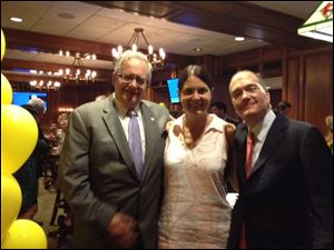 Joseph H. Zerbey IV, left, president and general manager of The Blade, celebrates his 70th birthday at the Toledo Club with Susan and Allan Block, chairman of Block Communications, Inc., parent
company of The Blade.