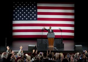 President Barack Obama speaks at a campaign event Saturday at the Milwaukee Theater. Obama and Republican nominee were busy this weekend collecting cash for a final barrage of campaign ads.