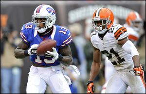 Buffalo Bills wide receiver Stevie Johnson catches a nine-yard touchdown pass in front of Cleveland Browns cornerback Dimitri Patterson in the fourth quarter. The score put the game out of reach.