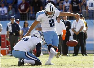 Tennessee Titans kicker Rob Bironas (2) kicks a 26-yard field goal in overtime to defeat the Detroit Lions 44-41 at an NFL football game on Sunday.