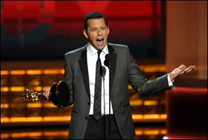Jon Cryer accepts the award for outstanding lead actor in a comedy series for 