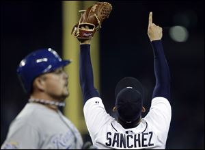 Pitcher Anibal Sanchez threw his first shutout in more than a year as the Tigers beat Kansas City 2-0, moving them into a first-place tie with the Chicago White Sox in the AL Central.