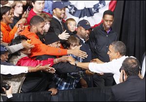 President Barack Obama campaigns Wednesday at the Bowling Green State University Stroh Center.