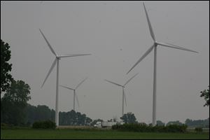 Several Midwestern states are eyeing the potential of wind-generated electricity to help reduce their dependence on coal. These wind turbines are in Bowling Green.