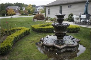 Maumee residents Garry and Carol Mulkey have used their quarter-acre yard to create several water features, including a fountain. In addition to a number of other plantings.