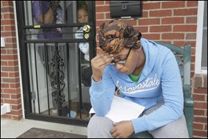 Shantel Weathers, 22, speaks about her killed cousin, Darrell Parnell, at the family home in Toledo.