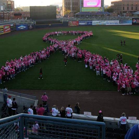 Survivors-create-a-pink-ribbon-in-left-field-in-Fifth