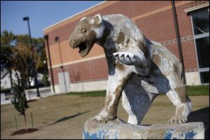 The statue of Woodward's polar bear mascot, Polaris, has become weathered after exposure to the elements since it was built in 1978.