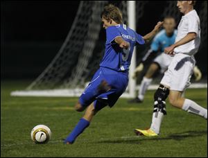 Anthony Wayne's Alex Hansen takes a shot on goal earlier this season.
