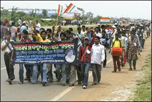 Student supporters of the Trinamul Congress Party demonstrate near the Tata Nano project site in Singur. Farmers launched a nearly two-year campaign to protest the government’s seizure of their land, sparking the violence that caused Tata Motors to vacate the plant.