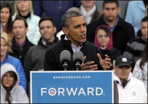 President Obama speaks at a campaign rally in Denver today.