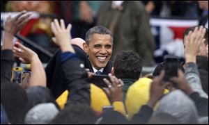 President Barack Obama shakes hands with supporters after speaking at a campaign event today at Cleveland State University.