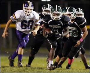 Start running back Deshawn Woodward runs had 288 yards on 26 rushes for the victorious Spartans.