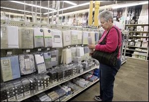 June Rollins of Temperance shops at the Andersons in Toledo. The Maumee-based retailer added about 10,000 more items within retail soft lines categories such as linens, towels, cookware, and room accessories, giving consumers more for their homes.