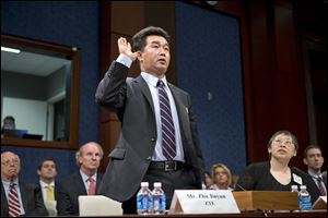 Zhu Jinyun, ZTE Corporation's senior vice president for North America and Europe, is sworn in on Capitol Hill in Washington, prior to testifying before the House Intelligence Committee as lawmakers probe whether Chinese tech giants' expansion in the U.S. market pose a threat to national security. In a report to be released Monday.