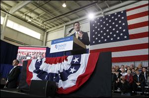Republican vice-presidential candidate Paul Ryan speaks today during a campaign rally in a Grand Aire hangar at Toledo Express Airport near Swanton.