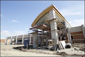 Construction of the project at Monroe Community College is to be completed in six or seven months. Work then will progress to interior finishing and furnishing.