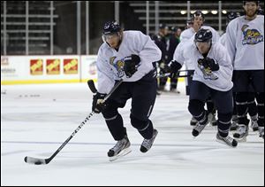 Captain Kyle Rogers moves the puck during training camp. Rogers was second on the team with 44 points, including 20 goals.

