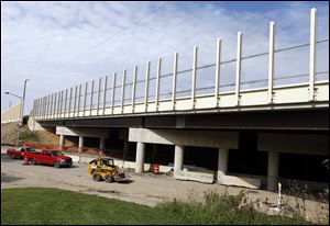 The wire-reinforced plastic panels cost more than opaque ones but are lighter weight, reducing the need for special engineering.