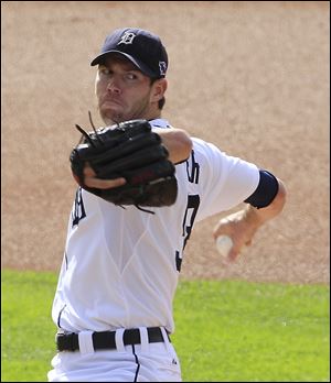 Detroit Tigers starting pitcher Doug Fister throws during the first inning of Game 2.