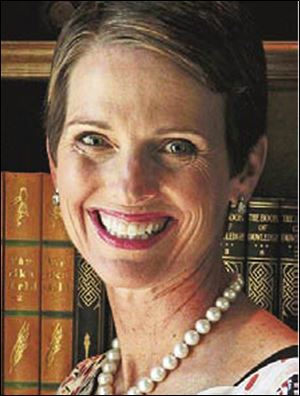 Breast cancer survivor Hollye Jacobs hosts a tea party as part of a fight against breast cancer.