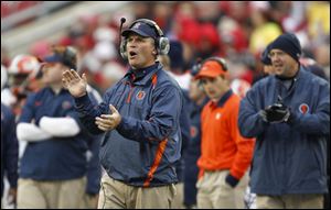 Tim Beckman, seen here last week at Wisconsin, is in his first year as Illinois head coach after spending the the previous three at Toledo.