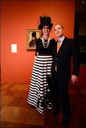 Allen and Susan Block in front of Manet's 