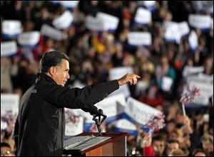 Republican Presidential candidate Mitt Romney talks to the crowd Tuesday in Cuyahoga Falls.