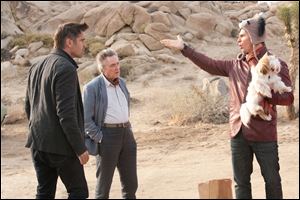 Colin Farrell, left, Christopher Walken, center, and Sam Rockwell in a scene in 