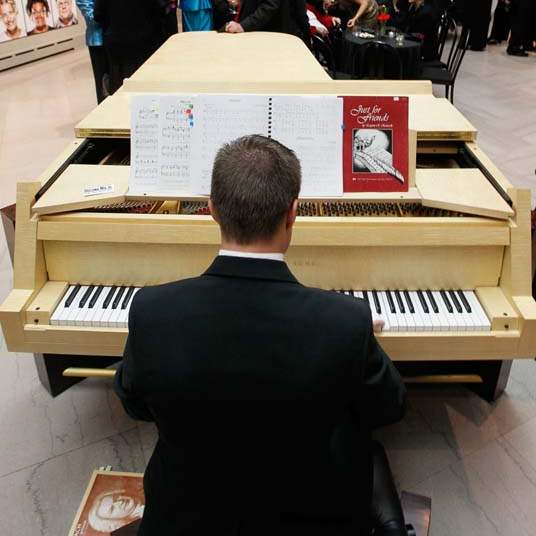 Centenary-dining-piano