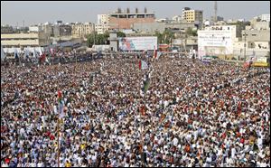 Supporters of Pakistani political party Muttahida Qaumi Movement (MQM), attend a rally to condemn the attack on 14-year-old schoolgirl Malala Yousufzai, who was shot last Tuesday by the Taliban for speaking out in support of education for women, in Karachi, Pakistan on Sunday.