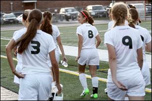 The Ottawa Hills Board of Education voted Tuesday to make girls lacrosse and girls soccer varsity sports.