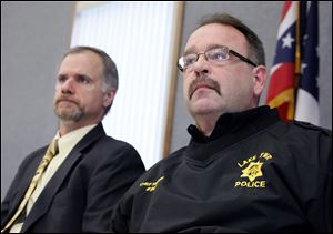 Wood County prosecutor Paul Dobson, left, and Lake Township Police Chief Mark Hummer.