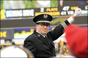 Jon Waters,  who was fired last month as director of the Ohio State University marching band, said he wants his old job back. 