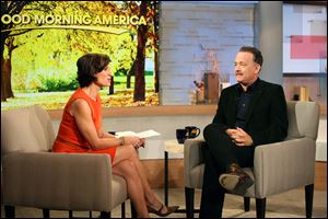 This image released by ABC shows actor Tom Hanks during an interview segment with Elizabeth Vargas on 