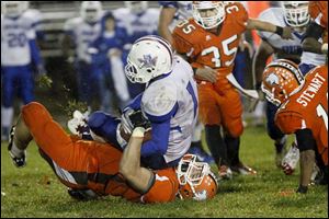 Southview's junior offensive lineman Ryan Stout takes down Springfield's junior running back Elijah Todd.