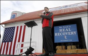Republican vice presidential candidate, Rep. Paul Ryan, R-Wis. gestures while speaking at a campaign rally Saturday at the Valley View Campgrounds in Belmont, Ohio.