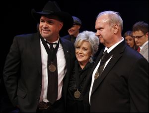 Garth Brooks, left, Connie Smith, center, and Hargus 