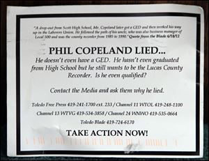George Sarantou presented this postcard attacking opponent Phil Copeland during a new conference.