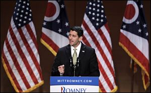 Republican vice presidential candidate Rep. Paul Ryan, R-Wis. gestures while speaking about upward mobility and the economy during a campaign rally at the Walter B. Waetjen Auditorium at Cleveland State University.
