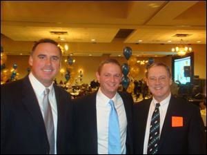 Greg Cepek, Dan McQuillen, and Dick Baker at the Danberry Treasure Chest charity auction.